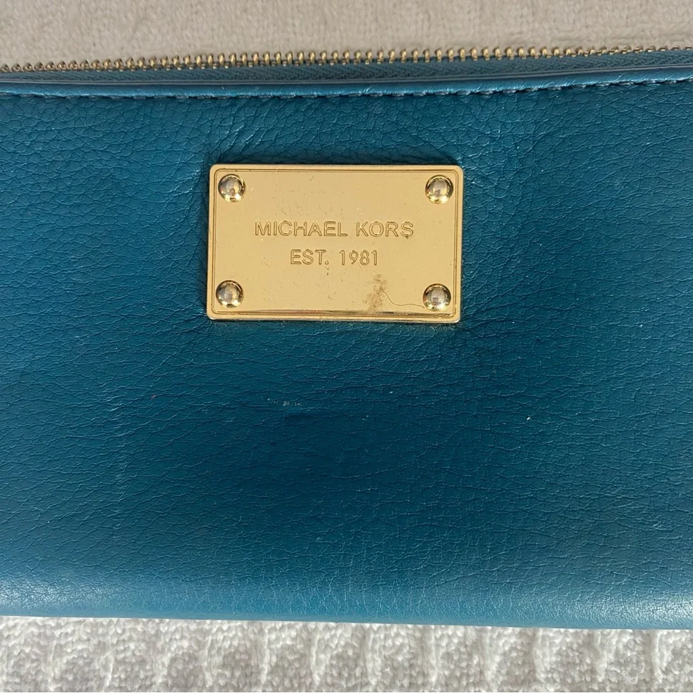 Michael Kors Teal Zip-Around Leather Wallet with Gold Plaque